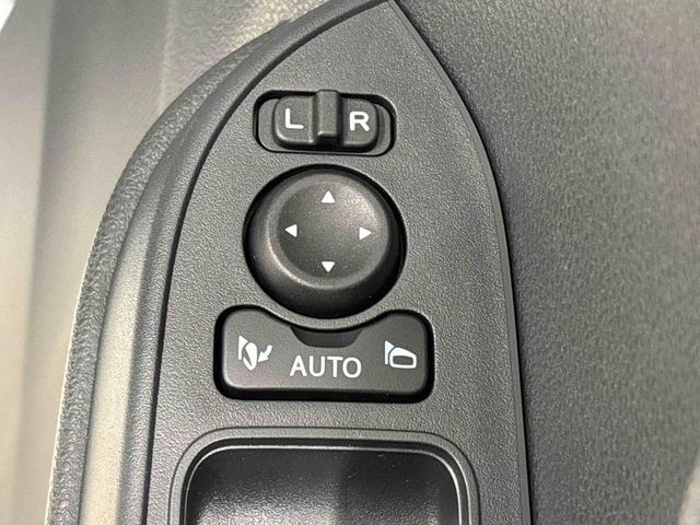 タント Ｘ　両側スライド片側電動スライドドア　キーフリーシステム　純正ナビ装着用アップグレードパック　運転席・助手席シートヒーター　電動式パワーステアリング　オートブレーキホールド機能　運転席シートリフター　チルトステアリング　格納式リヤドアサンシェード（24枚目）