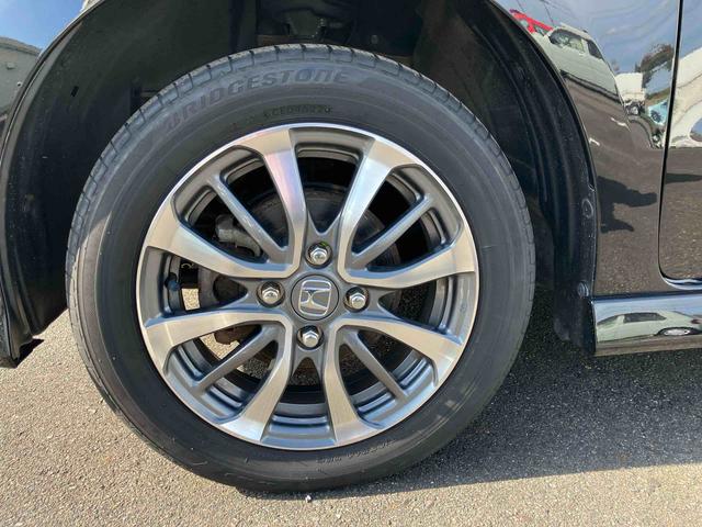 N-BOXカスタム L 4WD CVT 660cc 電動スライドドア ディスプレイオーディオ オートエアコン バックモニター 運転席・助手席エアバッグ ABS クルーズコントロール 車検整備付(12枚目)