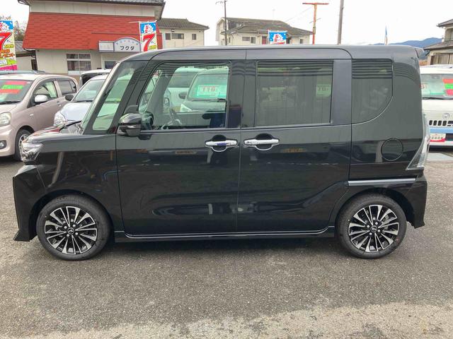 タント カスタムＲＳリミテッド　ターボ　２ＷＤ　ＣＶＴ　６６０ｃｃ　ターボ　両側電動スライドドア　衝突被害軽減ブレーキ　横滑り防止装置　ＡＢＳ　アイドリングストップ　プッシュボタンスタート　クルーズコントロール　届出済未使用車（3枚目）