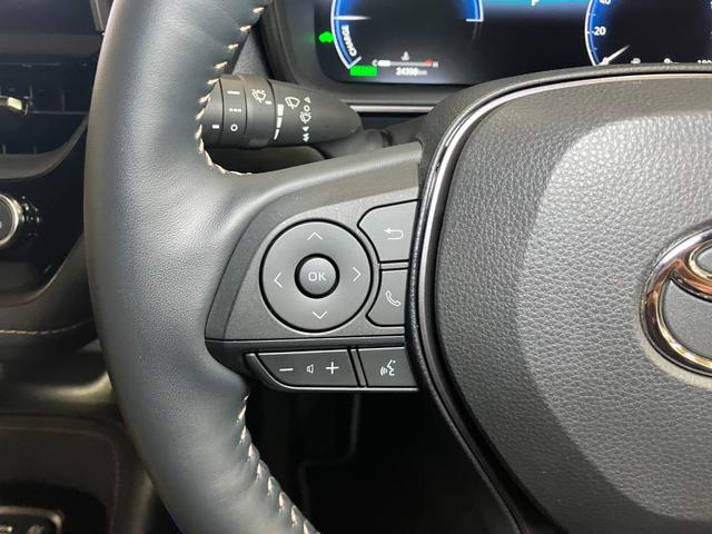 カローラ ハイブリッド　ダブルバイビー　衝突被害軽減ブレーキシステム　レーダークルーズコントロール　ステアリングスイッチ　シートヒーター　電動パーキングブレーキ　ドライブモード切り替えスイッチ　ＳＯＳスイッチ　ＥＴＣ　キーフリー（16枚目）