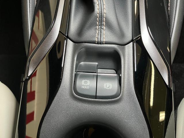 カローラ ハイブリッド　ダブルバイビー　衝突被害軽減ブレーキシステム　レーダークルーズコントロール　ステアリングスイッチ　シートヒーター　電動パーキングブレーキ　ドライブモード切り替えスイッチ　ＳＯＳスイッチ　ＥＴＣ　キーフリー（21枚目）