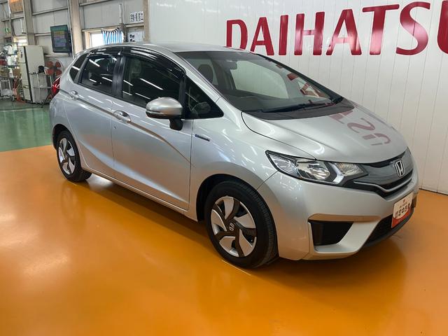 フィットハイブリッド Fパッケージ ハイブリッド Pスタート アクセサリーソケット 横滑り防止機能 誤発進抑制機能 光軸調整ダイヤル 電動格納ミラー パワーウインドウ キーフリー(7枚目)