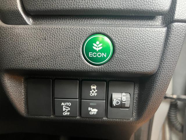 フィットハイブリッド Fパッケージ ハイブリッド Pスタート アクセサリーソケット 横滑り防止機能 誤発進抑制機能 光軸調整ダイヤル 電動格納ミラー パワーウインドウ キーフリー(20枚目)