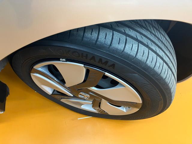 フィットハイブリッド Fパッケージ ハイブリッド Pスタート アクセサリーソケット 横滑り防止機能 誤発進抑制機能 光軸調整ダイヤル 電動格納ミラー パワーウインドウ キーフリー(26枚目)