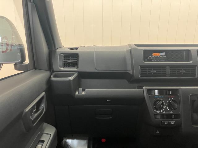 ハイゼットカーゴ ＤＸ　サポカーＳワイド適合　ラジオ　エアコン　アクセサリーソケット　コーナーセンサー　アイドリングストップ　光軸調整ダイヤル　横滑り防止機能　誤発進抑制機能　パワーウインドウ　キーレス（12枚目）