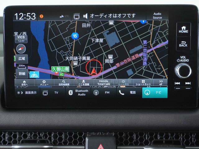 ＺＲ－Ｖ ｅ：ＨＥＶＺ　２年保証当社試乗車　９インチメーカー装着ホンダコネクトナビ　ＬＥＤヘッドライト　全周囲カメラ　ＥＴＣ２．０　衝突被害軽減システム　ワイヤレス充電器　パワーバックドア　シートヒーター（2枚目）