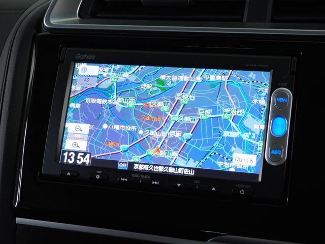 フィットハイブリッド Lパッケージ 衝突被害軽減システム/純正ナビゲーション/バックカメラ/音楽CD再生/オートエアコン/LEDヘッドライト/クルーズコントロール/ETC/スマートキー/盗難防止装置/横滑り制御装置/オートライト/ETC(2枚目)