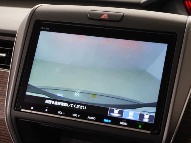 フリード+ハイブリッド ハイブリッド・クロスターホンダセンシング 1オ-ナ-ナビDレコRカメETC両電扉BT地デジ アダプティブクルーズコントロール Bluetooth シートヒーター 左側オートサイドステップ DVD 15インチ純正アルミホイール 禁煙車(3枚目)