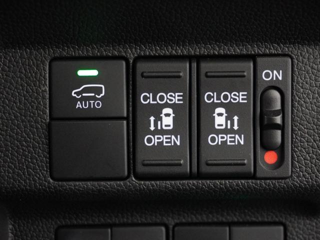 フリード+ハイブリッド ハイブリッド・クロスターホンダセンシング 1オ-ナ-ナビDレコRカメETC両電扉BT地デジ アダプティブクルーズコントロール Bluetooth シートヒーター 左側オートサイドステップ DVD 15インチ純正アルミホイール 禁煙車(7枚目)