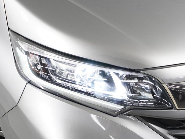 フリード+ハイブリッド ハイブリッド・クロスターホンダセンシング 1オ-ナ-ナビDレコRカメETC両電扉BT地デジ アダプティブクルーズコントロール Bluetooth シートヒーター 左側オートサイドステップ DVD 15インチ純正アルミホイール 禁煙車(16枚目)