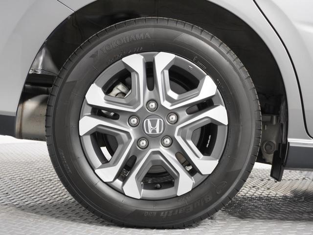 フリード+ハイブリッド ハイブリッド・クロスターホンダセンシング 1オ-ナ-ナビDレコRカメETC両電扉BT地デジ アダプティブクルーズコントロール Bluetooth シートヒーター 左側オートサイドステップ DVD 15インチ純正アルミホイール 禁煙車(20枚目)