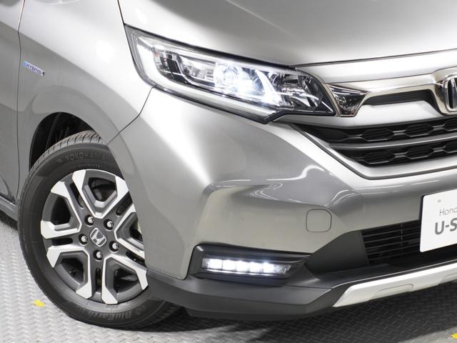 フリード+ハイブリッド ハイブリッド・クロスターホンダセンシング 1オ-ナ-ナビDレコRカメETC両電扉BT地デジ アダプティブクルーズコントロール Bluetooth シートヒーター 左側オートサイドステップ DVD 15インチ純正アルミホイール 禁煙車(31枚目)