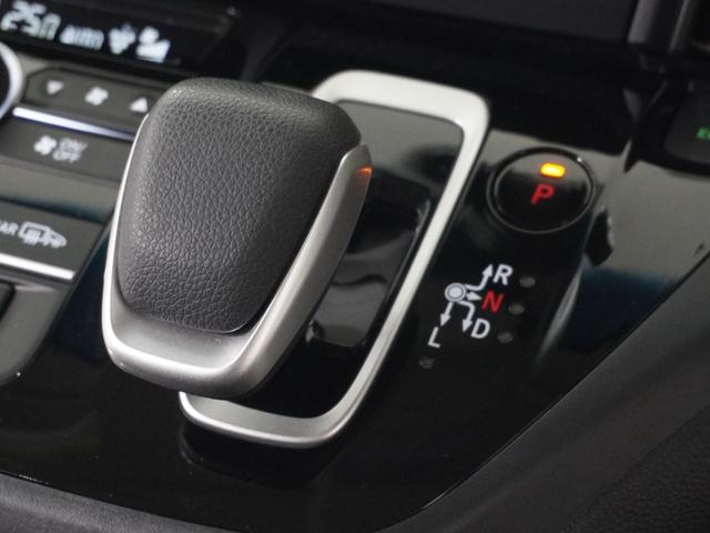 フリード+ハイブリッド ハイブリッド・クロスターホンダセンシング 1オ-ナ-ナビDレコRカメETC両電扉BT地デジ アダプティブクルーズコントロール Bluetooth シートヒーター 左側オートサイドステップ DVD 15インチ純正アルミホイール 禁煙車(59枚目)