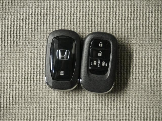 Ｎ－ＢＯＸ ベースグレード　当社試乗車ナビＤレコＲカメＥＴＣ両電扉ＢＴ地デジ　ＢＬＵＥＴＯＯＴＨ　衝突軽減システム　スマートキ－　車線維持支援システム　禁煙　電動格納式ドアミラー　カーテンエアバック　イモビライザー　ＥＣＯモード（23枚目）