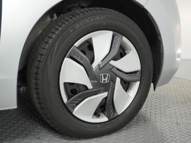 フィットハイブリッド Fパッケージ 1オ-ナ-ナビRカメETCワンセグBT接続DVD 盗難警報装置 ワンオ-ナ-車 AUTOエアコン 助手席エアバック ECON ETC付き リヤカメラ USB ABS付 DVD視聴 横滑り防止システム(17枚目)