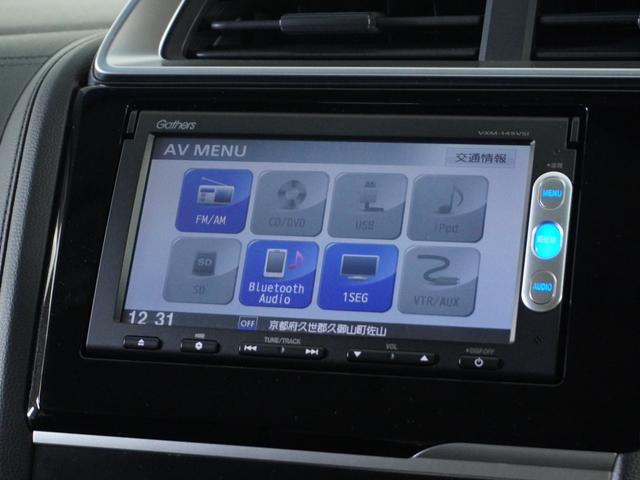 フィットハイブリッド Fパッケージ 1オ-ナ-ナビRカメETCワンセグBT接続DVD 盗難警報装置 ワンオ-ナ-車 AUTOエアコン 助手席エアバック ECON ETC付き リヤカメラ USB ABS付 DVD視聴 横滑り防止システム(19枚目)