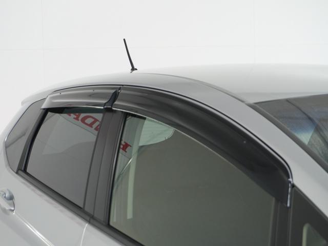 フィットハイブリッド Fパッケージ 1オ-ナ-ナビRカメETCワンセグBT接続DVD 盗難警報装置 ワンオ-ナ-車 AUTOエアコン 助手席エアバック ECON ETC付き リヤカメラ USB ABS付 DVD視聴 横滑り防止システム(28枚目)