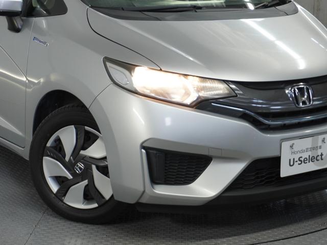 フィットハイブリッド Fパッケージ 1オ-ナ-ナビRカメETCワンセグBT接続DVD 盗難警報装置 ワンオ-ナ-車 AUTOエアコン 助手席エアバック ECON ETC付き リヤカメラ USB ABS付 DVD視聴 横滑り防止システム(29枚目)