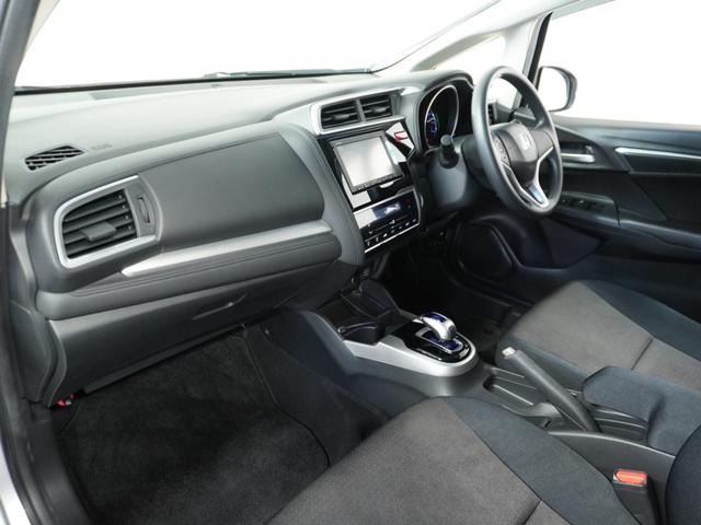 フィットハイブリッド Fパッケージ 1オ-ナ-ナビRカメETCワンセグBT接続DVD 盗難警報装置 ワンオ-ナ-車 AUTOエアコン 助手席エアバック ECON ETC付き リヤカメラ USB ABS付 DVD視聴 横滑り防止システム(31枚目)