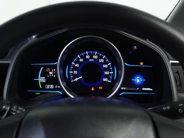 フィットハイブリッド Fパッケージ 1オ-ナ-ナビRカメETCワンセグBT接続DVD 盗難警報装置 ワンオ-ナ-車 AUTOエアコン 助手席エアバック ECON ETC付き リヤカメラ USB ABS付 DVD視聴 横滑り防止システム(48枚目)