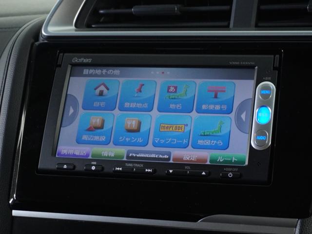 フィットハイブリッド Fパッケージ 1オ-ナ-ナビRカメETCワンセグBT接続DVD 盗難警報装置 ワンオ-ナ-車 AUTOエアコン 助手席エアバック ECON ETC付き リヤカメラ USB ABS付 DVD視聴 横滑り防止システム(54枚目)