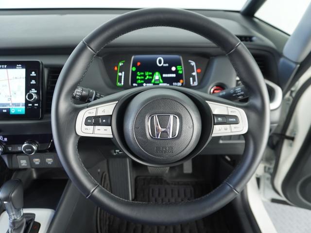 フィット e:HEVホーム 1オ-ナ-ナビ全周囲カメラETC2.0 前後誤発進抑制機能 クリソナ マルチビュー 助手席エアバッグ 運転席エアバッグ 1オナ アイドリングストップ LEDライト USB接続 バックカメラ ABS(10枚目)