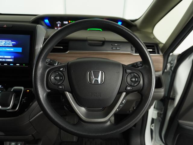 フリードハイブリッド ハイブリッド・Gホンダセンシング 1オ-ナ-両電扉ナビRカメラETC 軽減ブレーキ キーフリーシステム DVD再生可能 サイドカーテンエアバック ECON 後カメラ Aクルーズ 地デジフルセグTV LEDヘッドランプ シートH USB(12枚目)