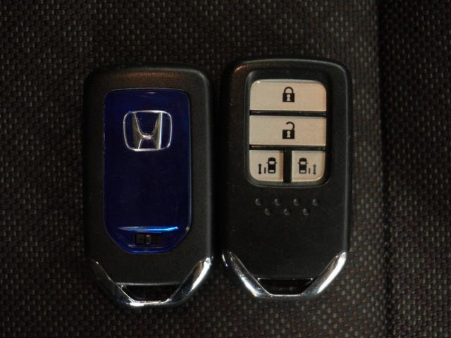 フリードハイブリッド ハイブリッド・Gホンダセンシング 1オ-ナ-両電扉ナビRカメラETC 軽減ブレーキ キーフリーシステム DVD再生可能 サイドカーテンエアバック ECON 後カメラ Aクルーズ 地デジフルセグTV LEDヘッドランプ シートH USB(24枚目)