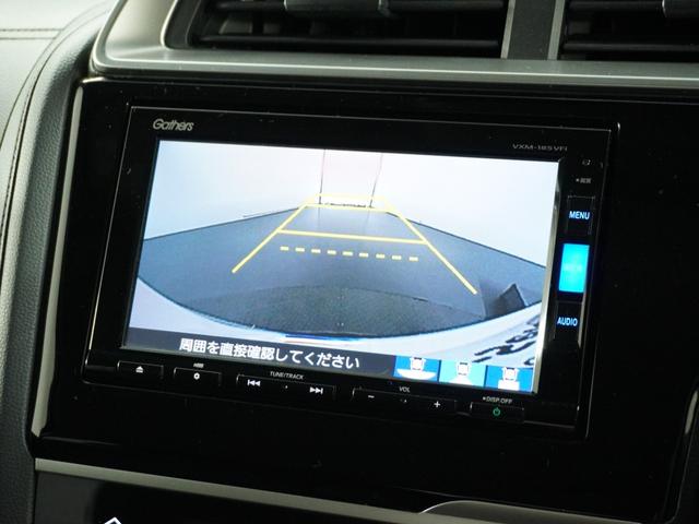 フィットハイブリッド F 1オ-ナ-ナビRカメETCクルコンBT地デジ 地デジTV ナビTV リアカメラ 横滑り防止装置 フルオートエアコン イモビライザー キーフリーシステム 全席パワーウインドウ パワーステアリング ABS(5枚目)