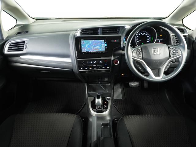 フィットハイブリッド F 1オ-ナ-ナビRカメETCクルコンBT地デジ 地デジTV ナビTV リアカメラ 横滑り防止装置 フルオートエアコン イモビライザー キーフリーシステム 全席パワーウインドウ パワーステアリング ABS(8枚目)