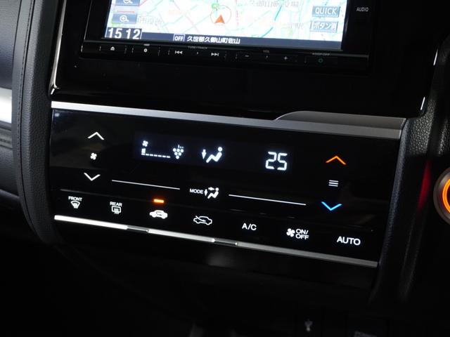 フィットハイブリッド F 1オ-ナ-ナビRカメETCクルコンBT地デジ 地デジTV ナビTV リアカメラ 横滑り防止装置 フルオートエアコン イモビライザー キーフリーシステム 全席パワーウインドウ パワーステアリング ABS(10枚目)