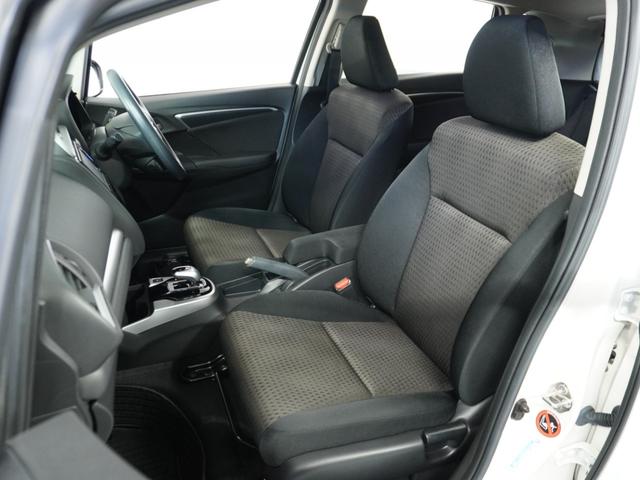 フィットハイブリッド F 1オ-ナ-ナビRカメETCクルコンBT地デジ 地デジTV ナビTV リアカメラ 横滑り防止装置 フルオートエアコン イモビライザー キーフリーシステム 全席パワーウインドウ パワーステアリング ABS(11枚目)