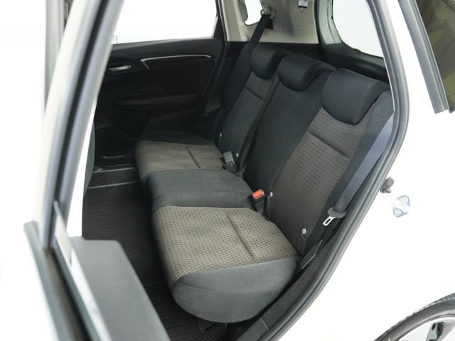 フィットハイブリッド F 1オ-ナ-ナビRカメETCクルコンBT地デジ 地デジTV ナビTV リアカメラ 横滑り防止装置 フルオートエアコン イモビライザー キーフリーシステム 全席パワーウインドウ パワーステアリング ABS(12枚目)