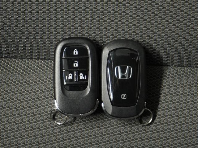 フリード クロスター　当社試乗車ナビＤレコＲカメＥＴＣ両電扉ＢＴ　地デジフルセグ　両側電動パワースライドドア　後カメラ　禁煙車両　ドラレコ　ＵＳＢ　盗難防止システム　ＬＥＤヘッドランプ　エアコン　ＥＳＣ　サイドエアバック（21枚目）