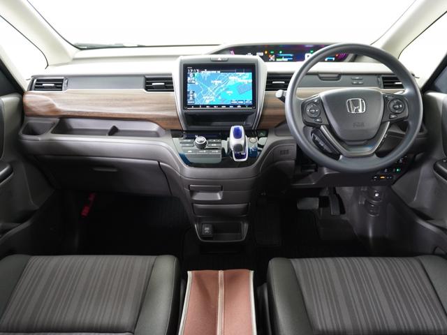 フリードハイブリッド ハイブリッド・Gホンダセンシング 1オ-ナ-ナビDレコRカメETC両電扉BT地デジ アダプティブクルーズコントロール Bluetooth 障害物センサー LEDヘッドライト フルセグ DVD再生 6人乗り3列シート 禁煙車 ECON(9枚目)