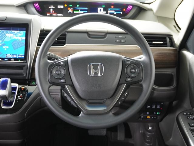 フリードハイブリッド ハイブリッド・Gホンダセンシング 1オ-ナ-ナビDレコRカメETC両電扉BT地デジ アダプティブクルーズコントロール Bluetooth 障害物センサー LEDヘッドライト フルセグ DVD再生 6人乗り3列シート 禁煙車 ECON(10枚目)