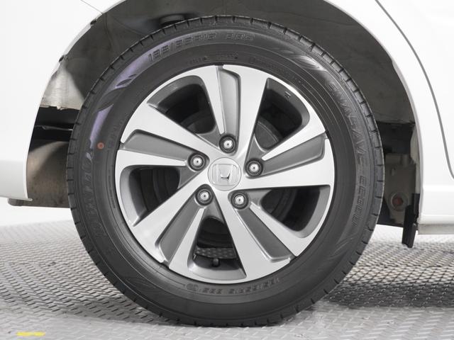 フリード Ｇ　ナビＲカメＤレコＥＴＣ両電扉ＢＴシ－トヒ－タ－　アダプティブクルーズコントロール　Ｂｌｕｅｔｏｏｔｈ　フルセグＴＶ　ＣＤ／ＤＶＤ再生　１５インチ純正アルミホイール　２列目ウォークスルー　禁煙車　ＬＥＤ（21枚目）