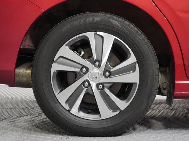 フリードハイブリッド ハイブリッド・Ｇホンダセンシング　１オ－ナ－ナビＤレコＲカメＥＴＣ両電扉ＢＴ地デジ　アダプティブクルーズコントロール　Ｂｌｕｅｔｏｏｔｈ　シートヒーター　１５インチ純正アルミホイール　フルセグＴＶ　ＤＶＤ　ＵＳＢ　スペアキー有　禁煙車（19枚目）