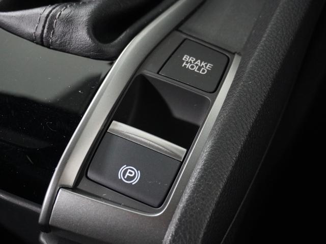 シビック ハッチバック 1オ-ナ-ナビDレコRカメETCクルコンBT アダプティブクルーズ Bluetooth シートヒーター オートハイビーム 18インチ純正アルミホイール 禁煙車 フルセグTV DVD再生 レーンアシスト(25枚目)