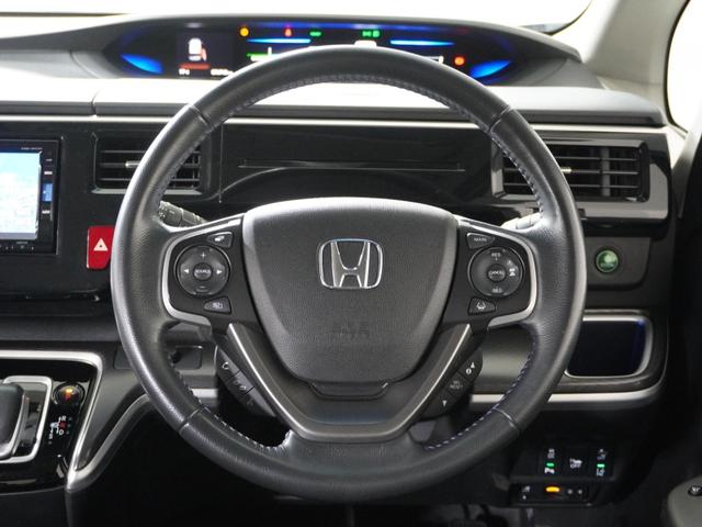 ステップワゴンスパーダ スパーダハイブリッドＧ・ＥＸホンダセンシングブラスタ　ナビＲカメＤレコＥＴＣ両電扉ＢＴ地デジ　アダプティブクルーズコントロール　Ｂｌｕｅｔｏｏｔｈ　シートヒーター　障害物センサー　１６インチ純正アルミホイール　禁煙車　フルセグ　ＤＶＤ　ＵＳＢ　スペアキー（11枚目）
