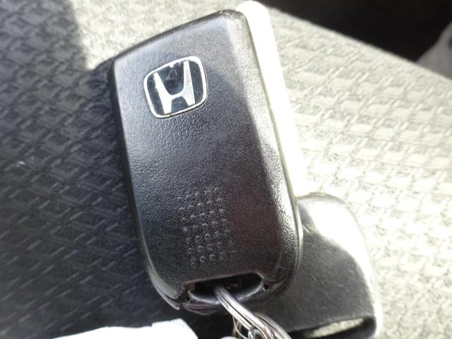 ステップワゴンスパーダ パワーエディション　ＨＩＤヘッドライト　オートライト　ＥＴＣ　メモリーナビ　バックカメラ　両側電動スライドドア　オートエアコン　後部座席マニュアルエアコン　一年保証（31枚目）