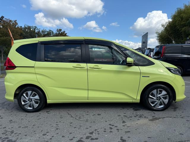 フリード＋ハイブリッド ハイブリッドＧ・ホンダセンシング　ＥＴＣ　スマートキー　両側電動スライドドア　衝突被害軽減ブレーキ　横滑り防止　Ｂｌｕｅｔｏｏｔｈ　バックモニター　オートライト　クルーズコントロール（7枚目）