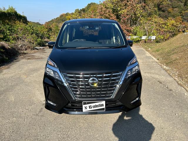 セレナ ハイウェイスターV スマートキー ETC 両側電動スライドドア フリップダウンモニター フルセグTV オートライト オートエアコン 純正ステアリング(4枚目)