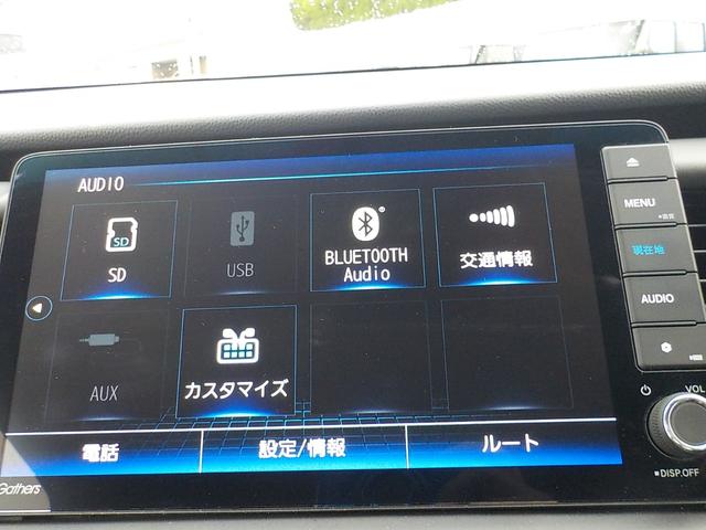フィット ｅ：ＨＥＶホーム　ワンオーナー・Ｂｌｕｅｔｏｏｔｈ・バックカメラ・ナビ連動前後ドライブレコーダー・ＥＴＣ車載器・障害物センサー・ＣＤ＆ＤＶＤ再生可・ＬＥＤヘッドライト・衝突被害軽減ブレーキ・ハーフレザーシート（11枚目）