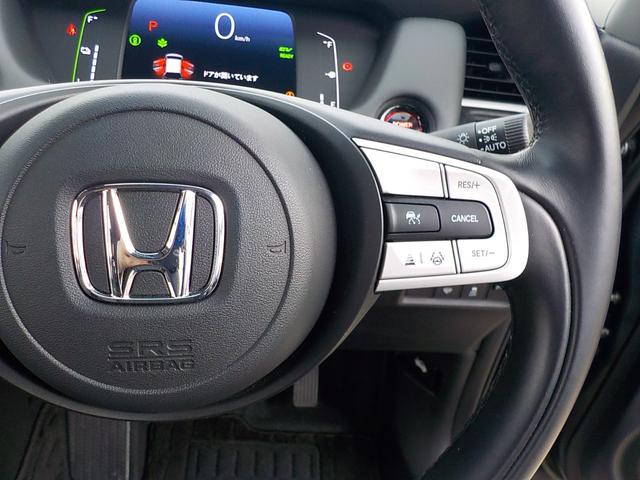 フィット ｅ：ＨＥＶホーム　ワンオーナー・Ｂｌｕｅｔｏｏｔｈ・バックカメラ・ナビ連動前後ドライブレコーダー・ＥＴＣ車載器・障害物センサー・ＣＤ＆ＤＶＤ再生可・ＬＥＤヘッドライト・衝突被害軽減ブレーキ・ハーフレザーシート（16枚目）