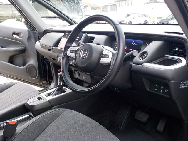 フィット ｅ：ＨＥＶホーム　ワンオーナー・Ｂｌｕｅｔｏｏｔｈ・バックカメラ・ナビ連動前後ドライブレコーダー・ＥＴＣ車載器・障害物センサー・ＣＤ＆ＤＶＤ再生可・ＬＥＤヘッドライト・衝突被害軽減ブレーキ・ハーフレザーシート（24枚目）