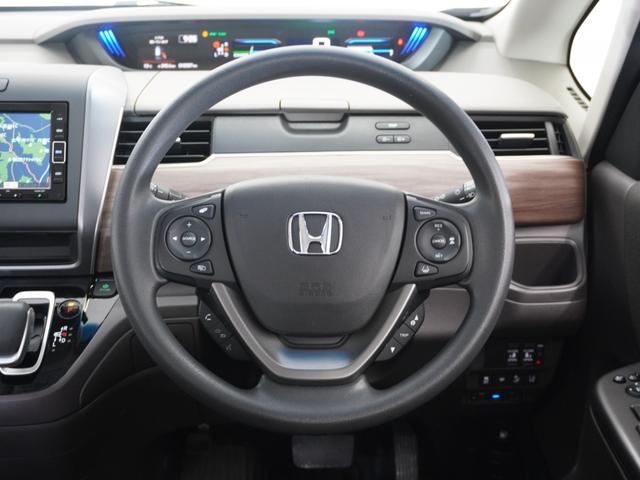 フリード+ハイブリッド ハイブリッドG 令和5年式 車検整備付 走行18,385Km タイプ(HV・G) ボディカラー(スーパープラチナグレーM)純正Gathers7インチナビ(VXM-234VFi)(10枚目)