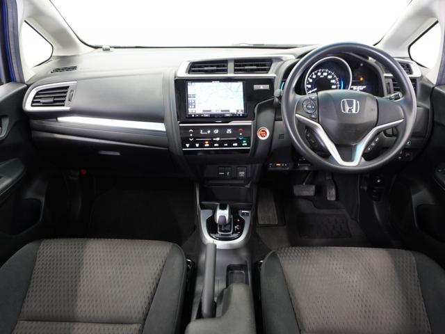 フィットハイブリッド F 平成29年式 車検整備付 走行82,127Km タイプ(ハイブリッドF) ボディカラー(ブリリアントスポーティーブルーM)社外品ナビ(6枚目)