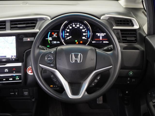 フィットハイブリッド F 平成29年式 車検整備付 走行82,127Km タイプ(ハイブリッドF) ボディカラー(ブリリアントスポーティーブルーM)社外品ナビ(7枚目)