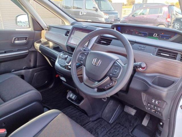 フリードハイブリッド ハイブリッドクロスターホンダセンシング　新品タイヤ／保証書／純正　９インチ　ＳＤナビ／衝突安全装置／両側電動スライドドア／車線逸脱防止支援システム／シート　ハーフレザー／パーキングアシスト　バックガイド／ヘッドランプ　ＬＥＤ　バックカメラ（29枚目）